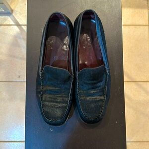 Tods Pony hair loafers.